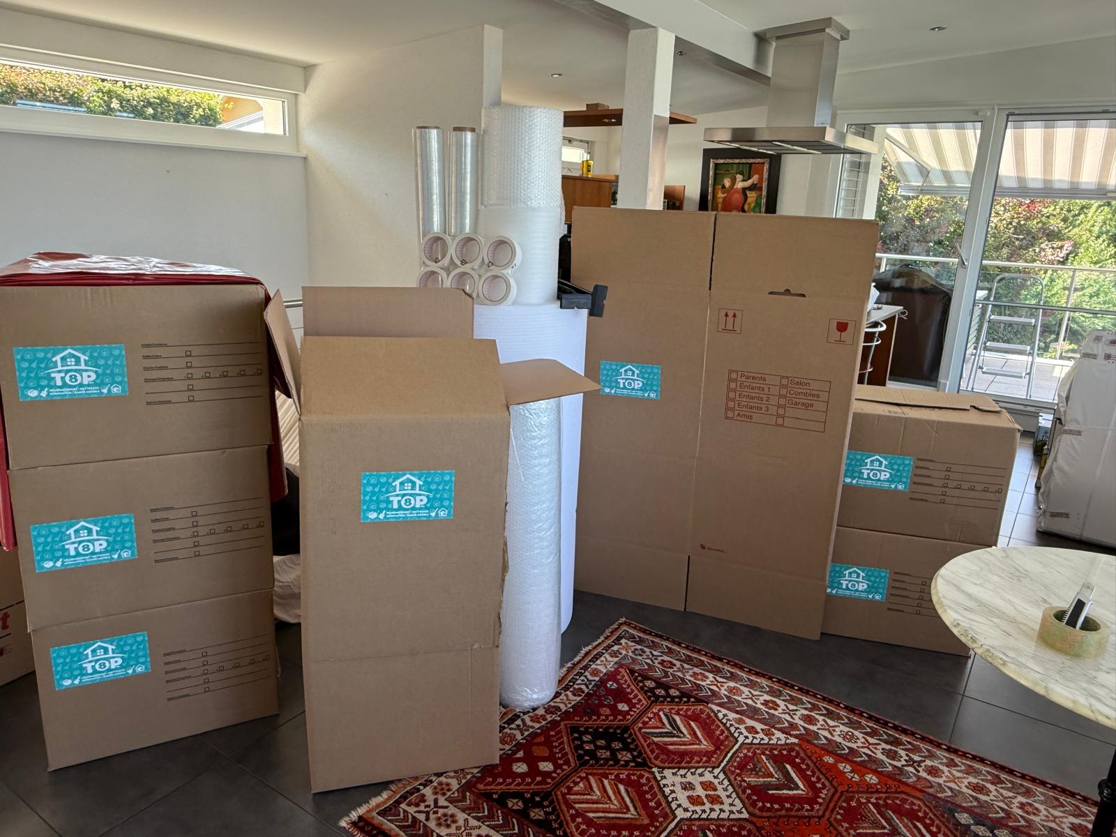Mise en carton soignée lors d'un déménagement privé par TOP8